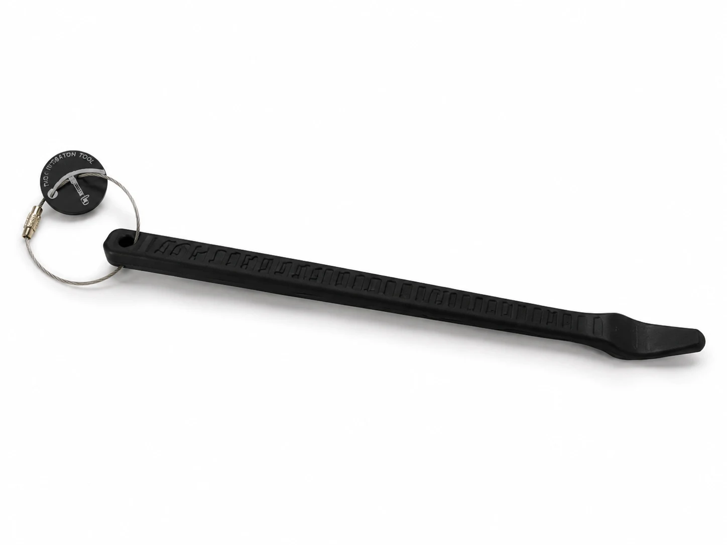 The Somnus Pig Intubation Assist Tool — a black plastic tool with a keyring loop, ridged grip, and a tapered flat end for repositioning the epiglottis.